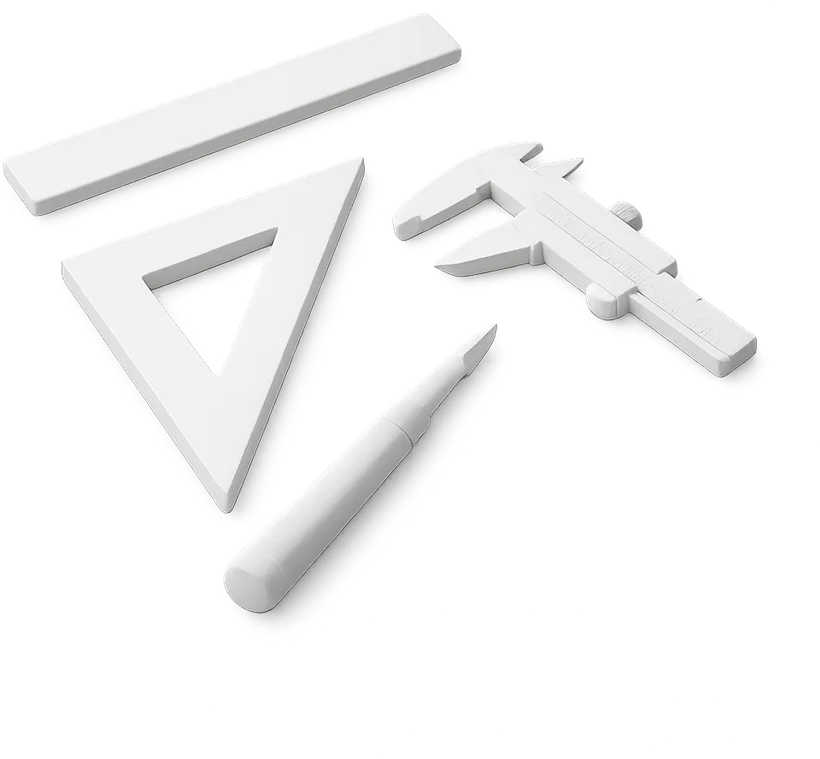 A rule, a set square, a chisel and a caliper, all carved from plaster, floating together.